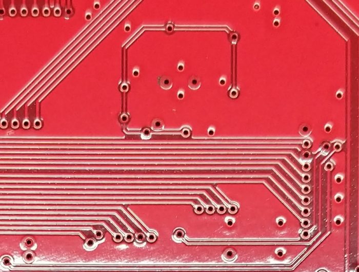 LPI soldermask covered vias to create tented vias.