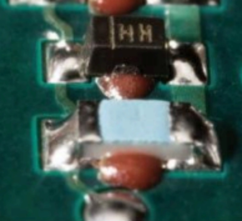 Red glue application for heavy SMT components in PCB assembly